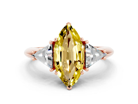Rose gold Three-Stone Marquise Cut Cut Diamond Ring with Trillion Side Stones and Four-Prong Setting