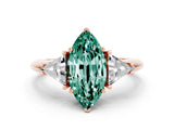 Rose gold Three-Stone Marquise Cut Cut Diamond Ring with Trillion Side Stones and Four-Prong Setting