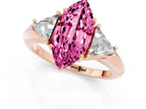 Rose gold Three-Stone Marquise Cut Cut Diamond Ring with Trillion Side Stones and Four-Prong Setting_1