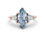 Rose gold Three-Stone Marquise Cut Cut Diamond Ring with Trillion Side Stones and Four-Prong Setting_23