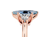 Rose gold Three-Stone Marquise Cut Cut Diamond Ring with Trillion Side Stones and Four-Prong Setting_28