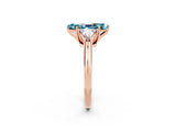 Rose gold Three-Stone Marquise Cut Cut Diamond Ring with Trillion Side Stones and Four-Prong Setting_2