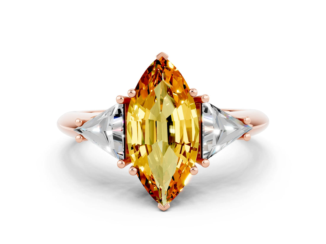 Rose gold Three-Stone Marquise Cut Cut Diamond Ring with Trillion Side Stones and Four-Prong Setting