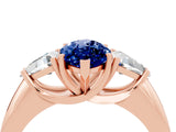 Rose gold Three-Stone Marquise Cut Cut Diamond Ring with Trillion Side Stones and Four-Prong Setting_4