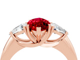 Rose gold Three-Stone Marquise Cut Cut Diamond Ring with Trillion Side Stones and Four-Prong Setting_4