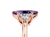 Rose gold Three-Stone Marquise Cut Cut Diamond Ring with Trillion Side Stones and Four-Prong Setting_5