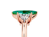 Rose gold Three-Stone Marquise Cut Cut Diamond Ring with Trillion Side Stones and Four-Prong Setting_5
