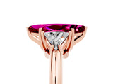 Rose gold Three-Stone Marquise Cut Cut Diamond Ring with Trillion Side Stones and Four-Prong Setting_5