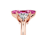 Rose gold Three-Stone Marquise Cut Cut Diamond Ring with Trillion Side Stones and Four-Prong Setting_5