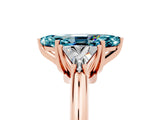 Rose gold Three-Stone Marquise Cut Cut Diamond Ring with Trillion Side Stones and Four-Prong Setting_5