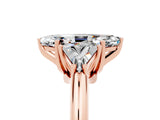 Rose gold Three-Stone Marquise Cut Cut Diamond Ring with Trillion Side Stones and Four-Prong Setting_5