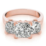 Rose gold Three-Stone Marquise Cut Diamond Ring with Channel Set Band and Four-Prong Setting 1