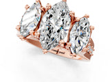 Rose gold Three-Stone Marquise Cut Diamond Ring with Channel-Set Band and Four-Prong Setting_65