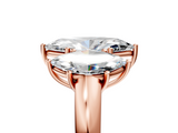 Rose gold Three-Stone Marquise Cut Diamond Ring with Channel-Set Band and Four-Prong Setting_69