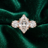 Rose gold Three-Stone Marquise Cut Diamond Ring with Round Accent Stones, Prong Setting, and Classic Band_6