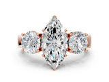 Rose gold Three-Stone Marquise Cut Diamond Ring with Round Side Stones, Classic Band, and Four-Prong Setting_3