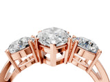 Rose gold Three-Stone Marquise Cut Diamond Ring with Round Side Stones, Classic Band, and Four-Prong Setting_7