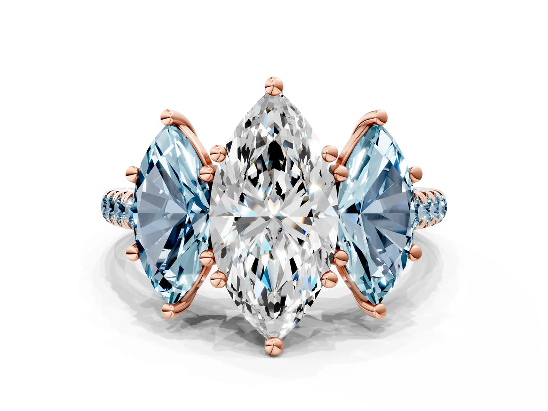 Rose gold Three-Stone Marquise Cut Diamond Ring with Round with Aquamarine side stone Pavé Band and Prong Setting