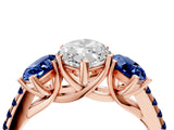 Rose gold Three-Stone Marquise Cut Diamond Ring with Round with Blue Sapphire side stone Pavé Band and Prong Setting_4