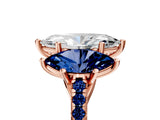 Rose gold Three-Stone Marquise Cut Diamond Ring with Round with Blue Sapphire side stone Pavé Band and Prong Setting_5