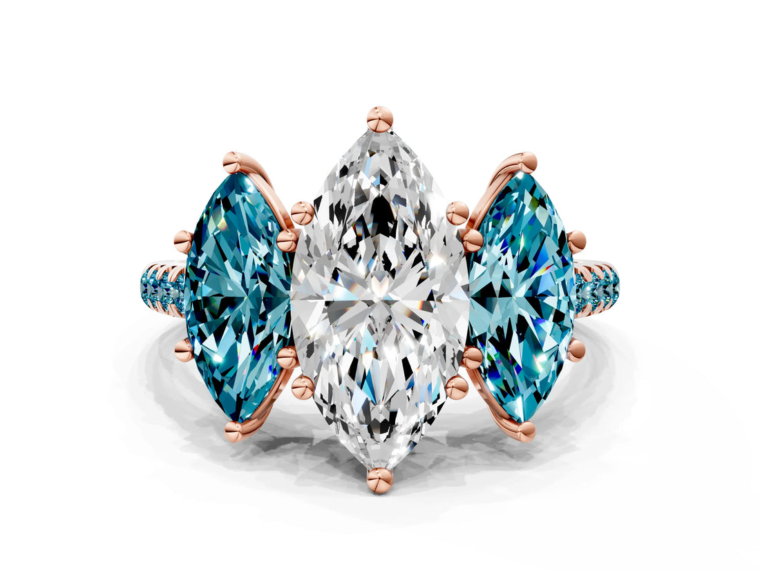 Rose gold Three-Stone Marquise Cut Diamond Ring with Round with Blue Topaz side stone Pavé Band and Prong Setting