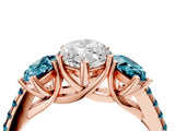 Rose gold Three-Stone Marquise Cut Diamond Ring with Round with Blue Topaz side stone Pavé Band and Prong Setting_4