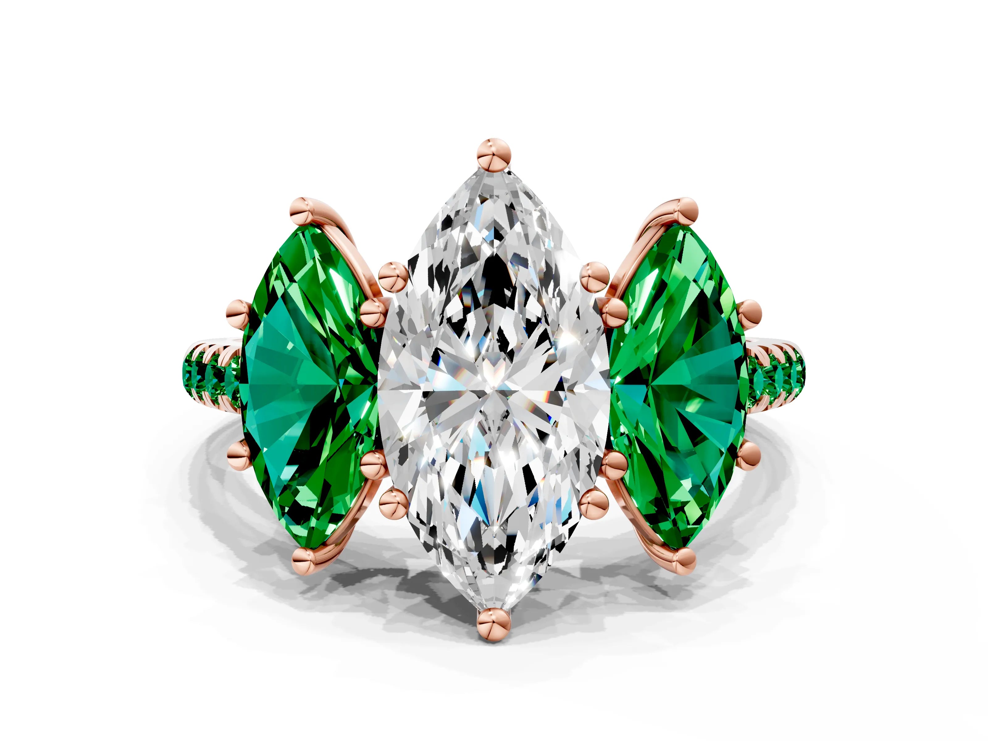 Rose gold Three-Stone Marquise Cut Diamond Ring with Round with Emerald side stone Pavé Band and Prong Setting