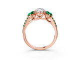 Rose gold Three-Stone Marquise Cut Diamond Ring with Round with Emerald side stone Pavé Band and Prong Setting_3