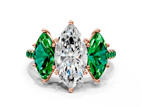 Rose gold Three-Stone Marquise Cut Diamond Ring with Round with Emerald side stone Pavé Band and Prong Setting