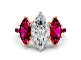 Rose gold Three-Stone Marquise Cut Diamond Ring with Round with Garnet side stone Pavé Band and Prong Setting