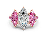 Rose gold Three-Stone Marquise Cut Diamond Ring with Round with Pink Sapphire side stone Pavé Band and Prong Setting