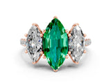Rose gold Three-Stone Marquise Cut Emerald Ring with Pavé Band and Prong Setting_12