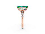 Rose gold Three-Stone Marquise Cut Emerald Ring with Pavé Band and Prong Setting_14