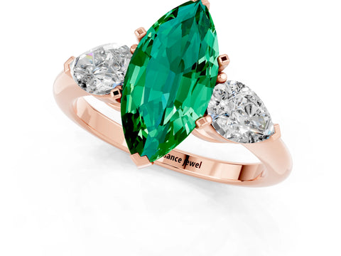 Rose gold Three-Stone Marquise Cut Emerald Ring with Pear Side Stones and Four-Prong Setting_1
