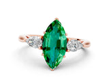 Rose gold Three-Stone Marquise Cut Emerald Ring with Pear  Side Stones in Four-Prong Setting_12