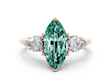 Rose gold Three-Stone Marquise Cut Green Sapphire Ring with Pear Side Stones and Four-Prong Setting