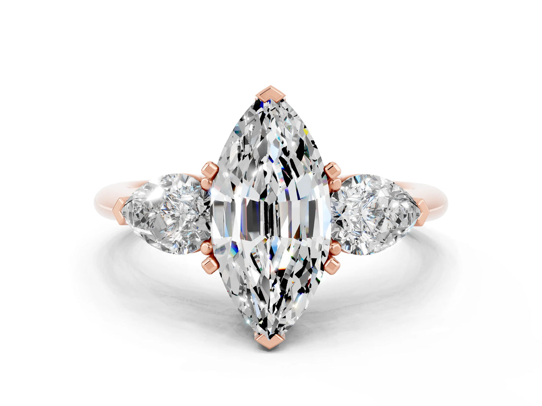 Rose gold Three-Stone Marquise Cut Moissanite Ring with Pear Side Stones and Four-Prong Setting