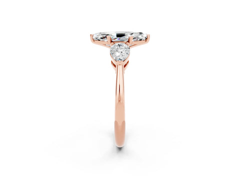 Rose gold Three-Stone Marquise Cut Moissanite Ring with Pear Side Stones and Four-Prong Setting_2