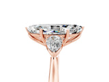 Rose gold Three-Stone Marquise Cut Moissanite Ring with Pear  Side Stones in Four-Prong Setting_17