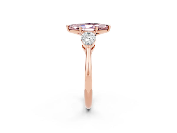 Rose gold Three-Stone Marquise Cut Morganite Ring with Pear Side Stones and Four-Prong Setting