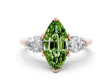 Rose gold Three-Stone Marquise Cut Peridot Ring with Pear Side Stones and Four-Prong Setting