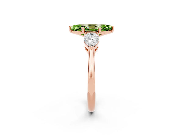 Rose gold Three-Stone Marquise Cut Peridot Ring with Pear Side Stones and Four-Prong Setting