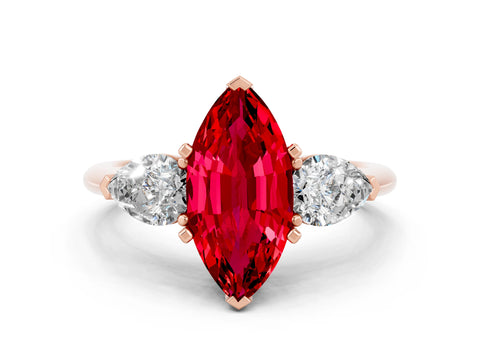 Rose gold Three-Stone Marquise Cut Ruby Ring with Pear Side Stones and Four-Prong Setting