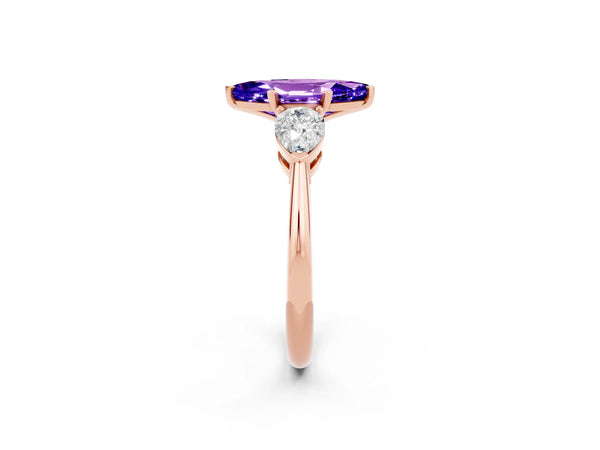 Rose gold Three-Stone Marquise Cut Tanzanite Ring with Pear Side Stones and Four-Prong Setting