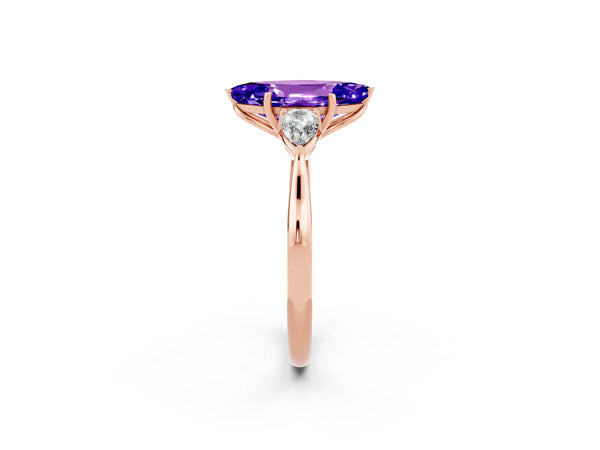 Rose gold Three-Stone Marquise Cut Tanzanite Ring with Pear  Side Stones in Four-Prong Setting