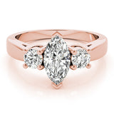 Rose gold Three-Stone Marquise Diamond Solitaire with Round Accents and Prong Setting on a Classic Band 1