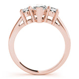 Rose gold Three-Stone Marquise Diamond Solitaire with Round Accents and Prong Setting on a Classic Band 2