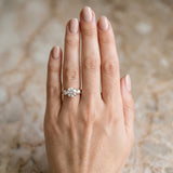Rose gold Three-Stone Marquise Diamond Solitaire with Round Accents and Prong Setting on a Classic Band_6