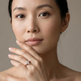 Rose gold Three-Stone Marquise Diamond Solitaire with Round Accents and Prong Setting on a Classic Band_7