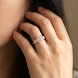 Rose gold Three-Stone Marquise Diamond Solitaire with Round Accents and Prong Setting on a Classic Band_8